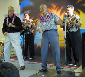 Fred and Sam Kamaka entertain the crowd with a hula at the induction of their father Samuel Kamaka at Ukulele Expo 2000